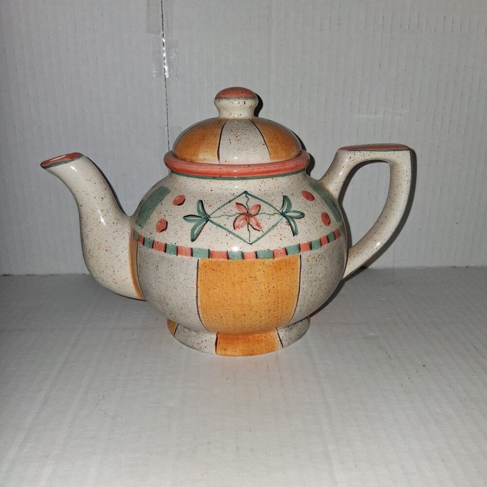 1998 cbk ltd llc tea pot made in china multi color no chips or cracks